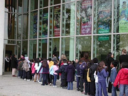 Schoolchildren lined up outside the Carpenter Center lobby