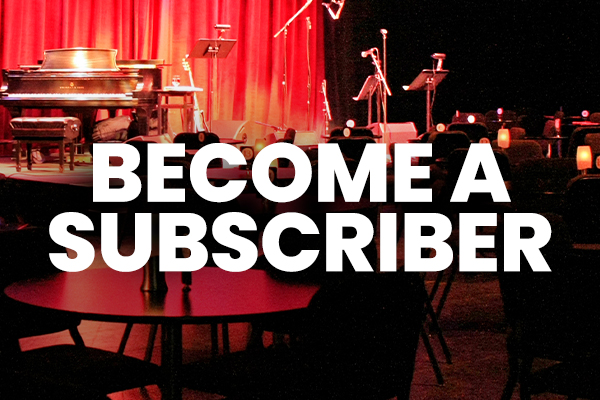 A view of our Cabaret stage with the words Become a Subscriber
