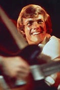 Richard Carpenter on stage, smiling