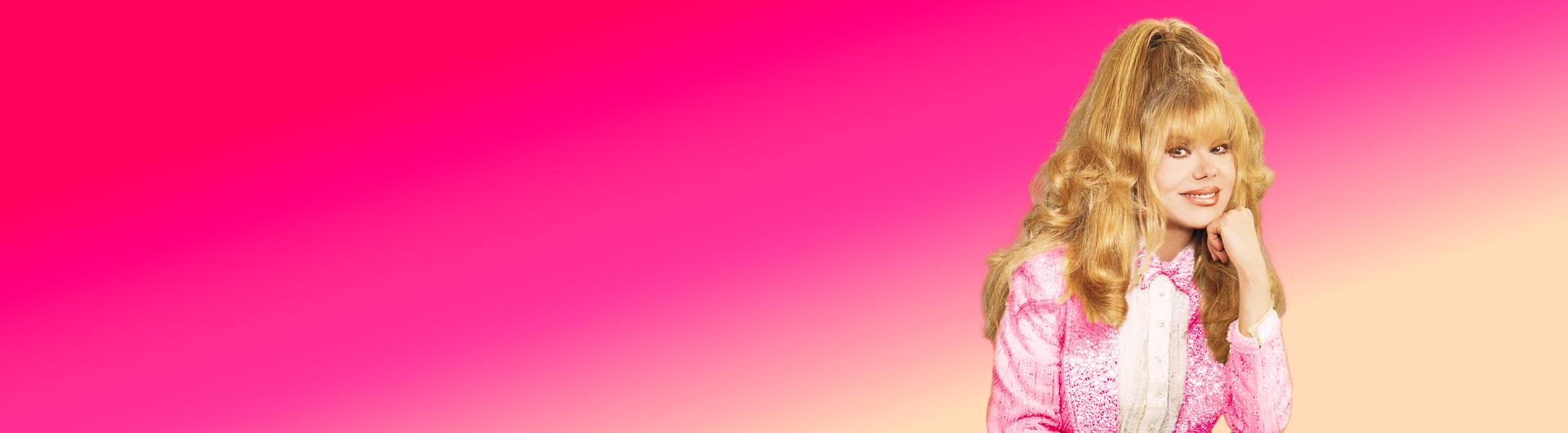 Charo resting her head on her hand against a colorful pink gradient.