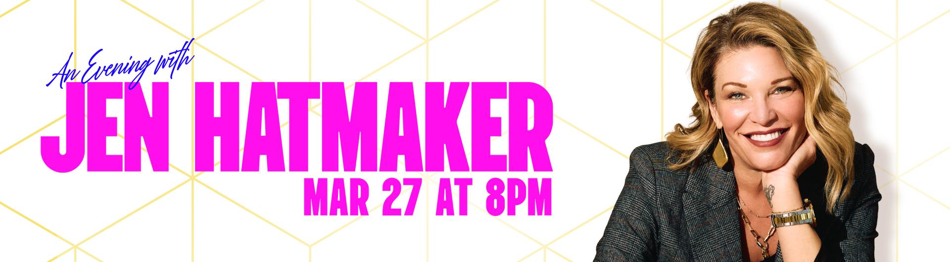 Jen Hatmaker resting her head in her palm and smiling.