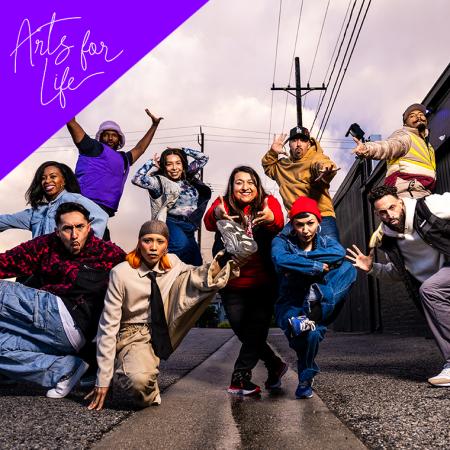 A dynamic group of dancers posing energetically in a street setting, with vibrant purple design elements and the "Arts for Life" logo.